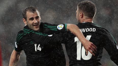 Niall McGinn and Oliver Norwood