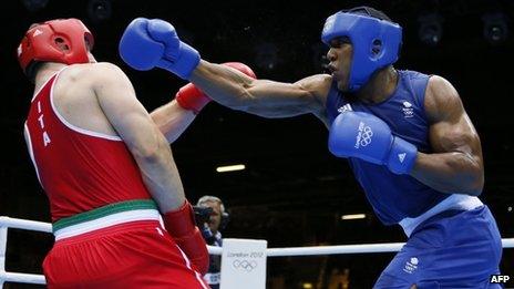 Italy's Roberto Cammarelle and Anthony Joshua