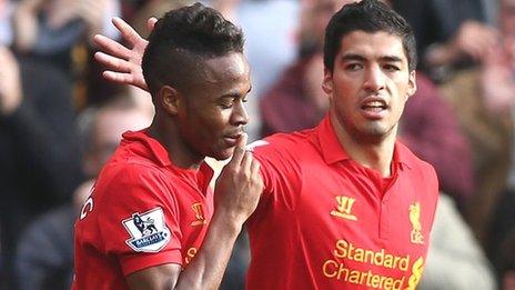 Raheem Sterling (left) is congratulated by Luis Suarez after scoring