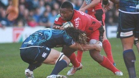 Toulon try-scorer Steffon Armitage is tackled by Blues' Josh Navidi