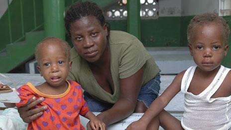 Daphne Orrel and her children in a cholera clinic in St Marc