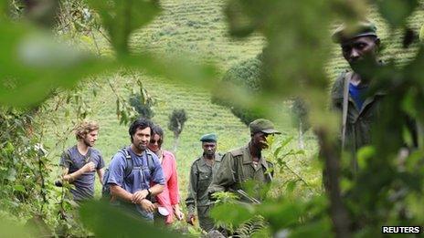 Virunga National Park rangers and tourists