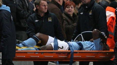 Micah Richards is carried off on a stretcher