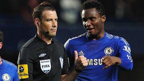 Mark Clattenburg and John Obi Mikel