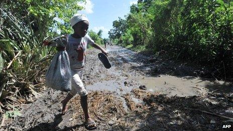 Child walks through damaged fields in Leogane - 27 October