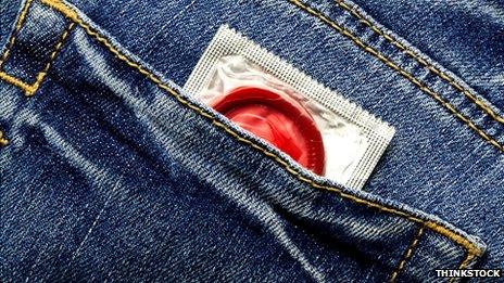 A condom in a jean pocket