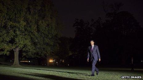 President Obama at White House at night