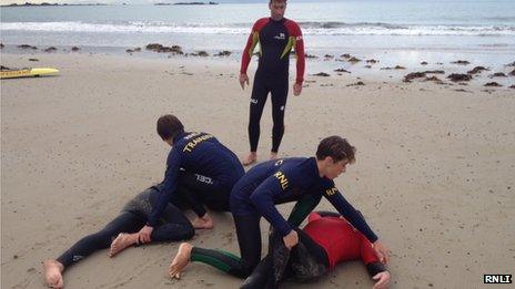 Lifeguards practicing first aid