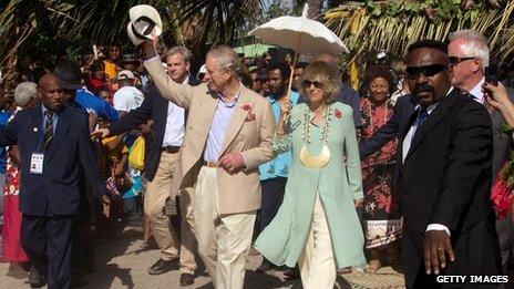 Prince Charles and the Duchess of Cornwall acknowledges locals at Boera village in Papua New Guinea