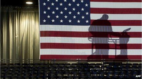 Workers complete the final details on US President Barack Obama's election night event at McCormick Place in Chicago, Illinois