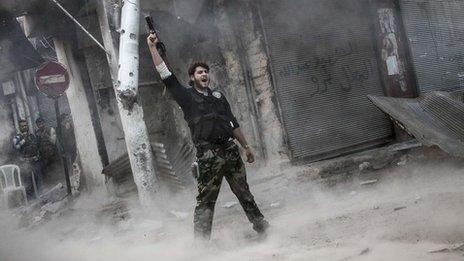 A Syrian rebel fighter in Aleppo, 4 November 2012