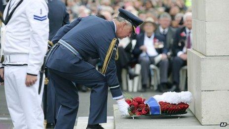 Prince Charles laying a wreath