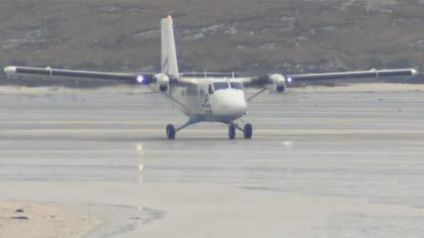 Plane landing at Barra