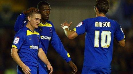 Charlie Strutton (left) celebrates his goal