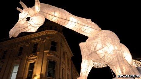 A giraffe in the 2011 City of Lights parade - Pic: City of Lights