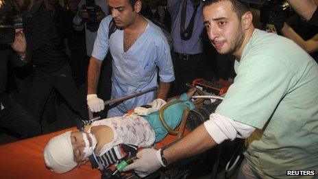 Child injured in air strike, Gaza City, 14 Nov 12