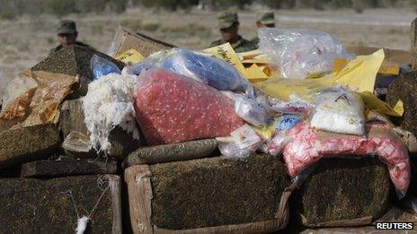 Marijuana packages and other drugs are piled up before being incinerated at the seventh Military Zone on the outskirts of Monterrey on 1 November 2012.