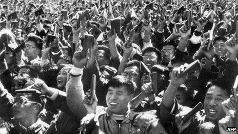 Chinese youths waving copies of Chairman Mao Zedong's "Little Red Book" as the celebrates China's National Day in Beijing, October 1967