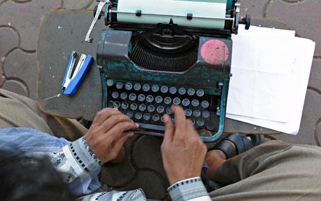 Typist outside court in Mumbai