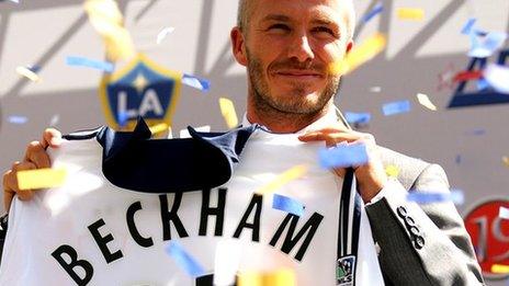 David Beckham poses with LA Galaxy shirt