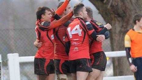 Redruth celebrate a try against Henley last season