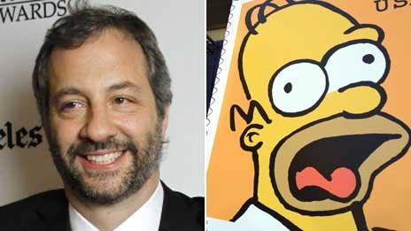 Judd Apatow and an enlarged stamp bearing the face of Homer Simpson