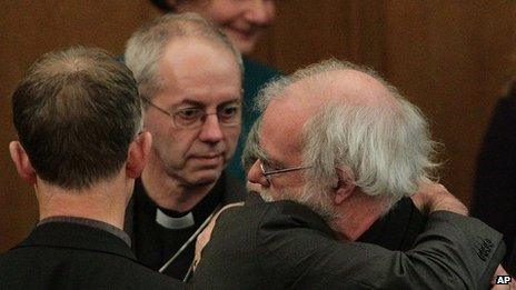 Rowan Williams and his successor Justin Welby after the synod rejected the women bishops measure.