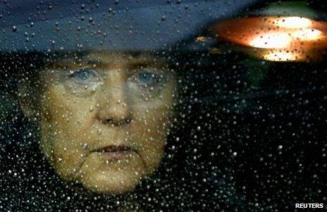 German Chancellor Angela Merkel arrives at the EU council headquarters in Brussels, 23 November