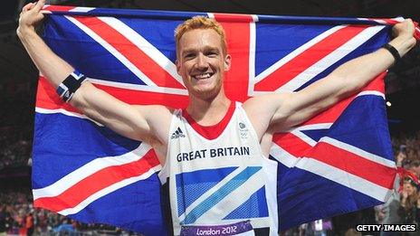 Greg Rutherford celebrates winning gold at London 2012