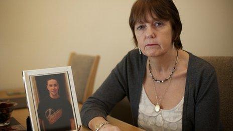 Jane Bennett with a photo of her son Scott