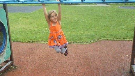 April Jones on a climbing frame