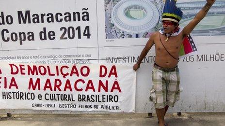 An indigenous Brazilian takes part in a protest against the privatisation of the Maracana stadium, 1 December