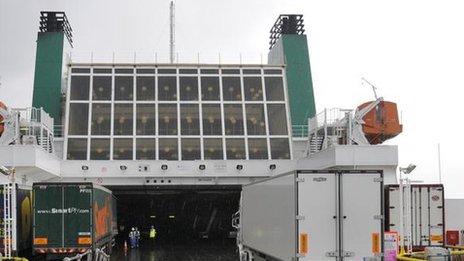 Trucks enter a ferry