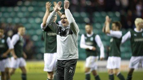 Hibs manager Pat Fenlon salutes the happy home support at Easter Road