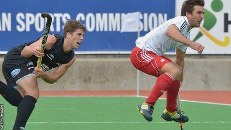 New Zealand's Nicholas Wilson and England's Adam Dixon