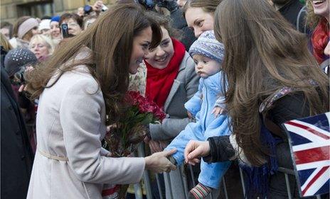 The Duchess of Cambridge talks to a baby fan