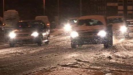 Cars driving through snow in Luton