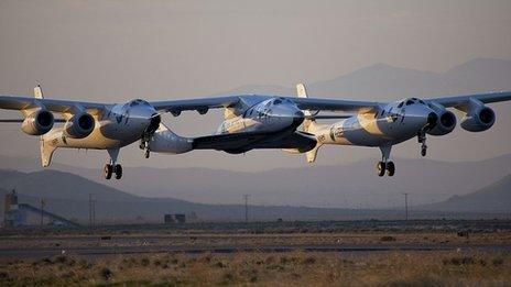 WhiteKnightTwo, christened VMS Eve after Richard Branson's mother Eve, and SpaceShipTwo, known as VSS Enterprise, take to the skies during a test flight in Mojave, CA, USA. Credit Mark Greenberg