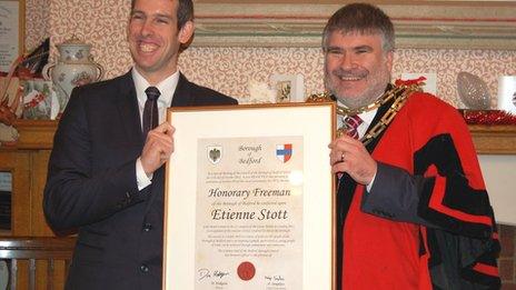 Etienne Stott (left) receives the freedom of the borough of Bedford