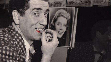 A young Johnny Beattie photographed backstage in his dressing room in a 1950s variety theatre show.