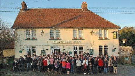 villagers outside The Green Man in Toppesfield