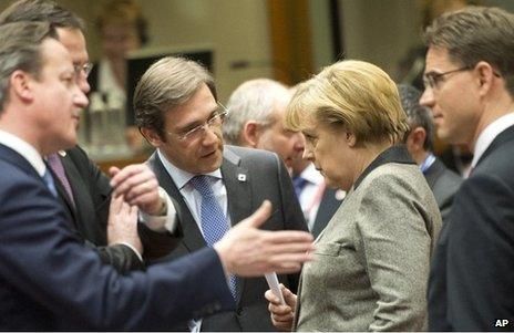 (From left) British Prime Minister David Cameron, Portugal's Prime Minister Pedro Passos Coelho, German Chancellor Angela Merkel and Finland's Prime Minister Jyrki Tapani Katainen chat at the EU summit on Brussels, 13 December