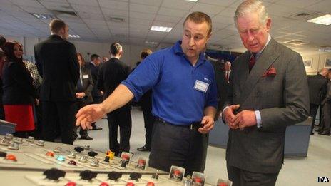 Prince Charles during his tour of Tata