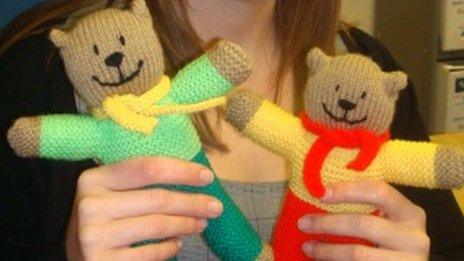 Knitted bears being presented to hospitals by West Mercia Police