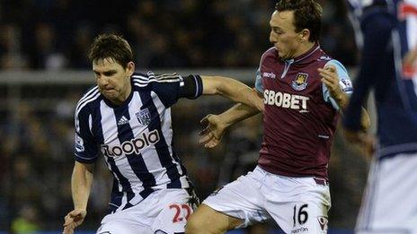 West Brom midfielder Zolten Gera (left) and West Ham midfielder Mark Noble