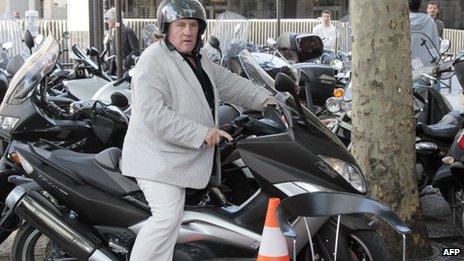 File pic from May 2011 of Gerard Depardieu on a motorbike in PAris