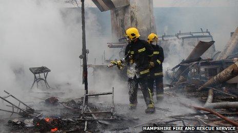 Fire-fighters tackle the blaze at the farm in Colemore