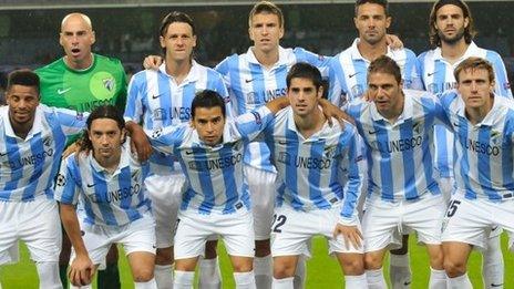 Malaga's players posing before the Champions League football match against Rsc Anderlecht in October