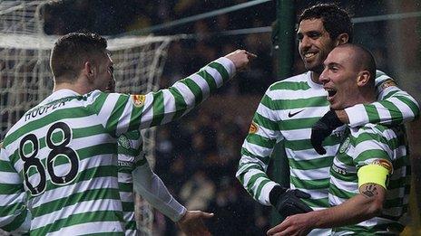 Gary Hooper, Lassad and Scott Brown celebrate