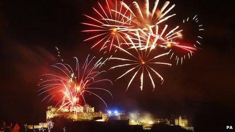 Fireworks go off over Edinburgh Castle as part of the new year 2013 Edinburgh Hogmanay celebrations in Scotland